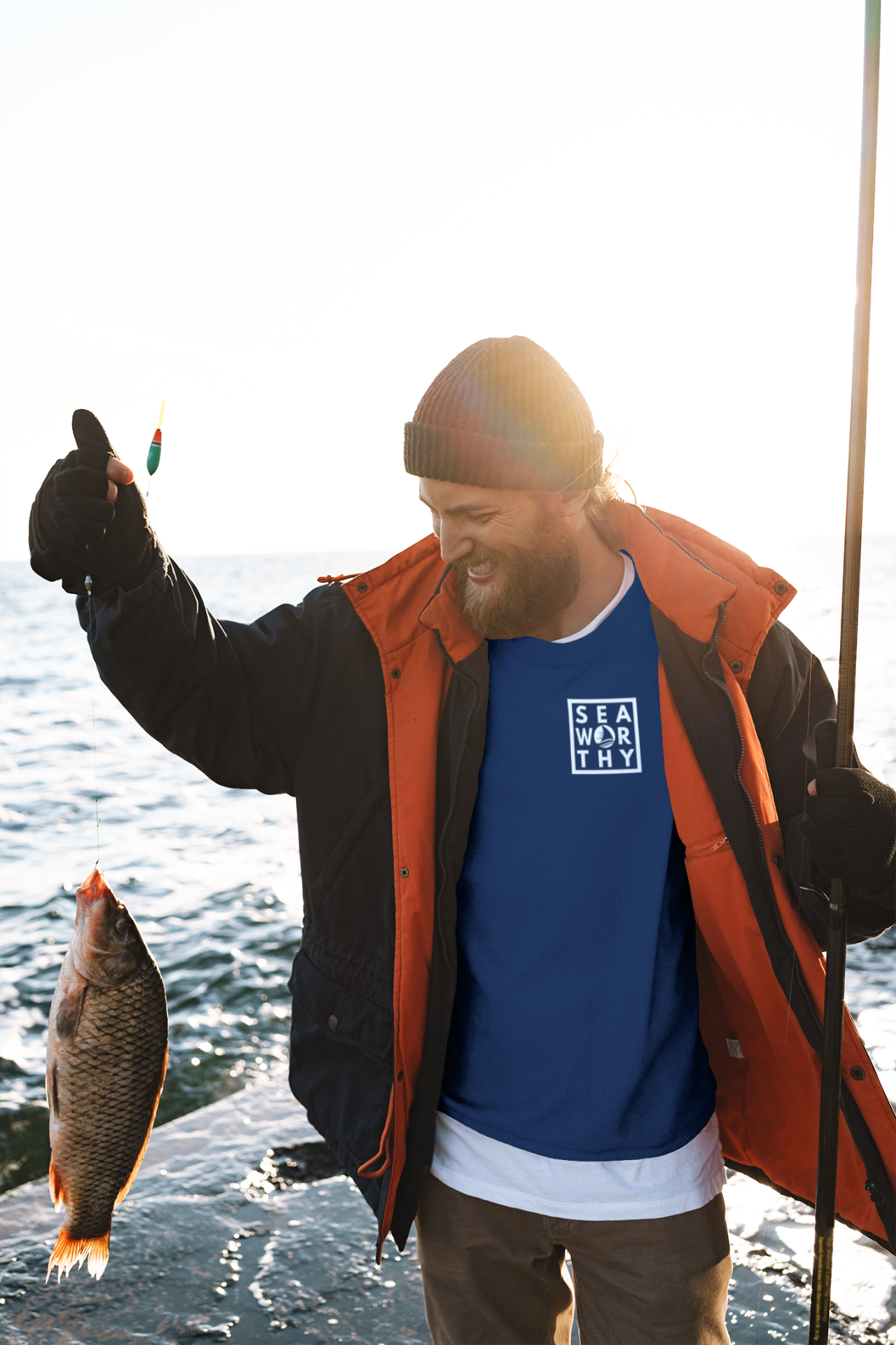 Fisherman on the coast wearing a Seaworthy shirt